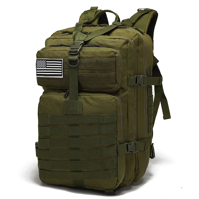 Green tactical backpack with American flag patch on a white background