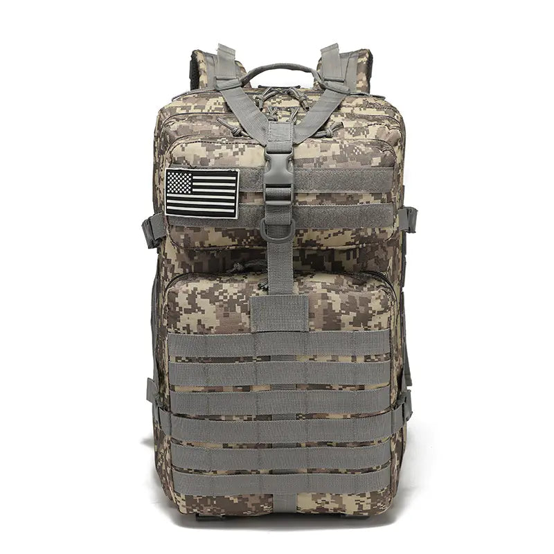 Camouflage backpack with American flag patch on a white background