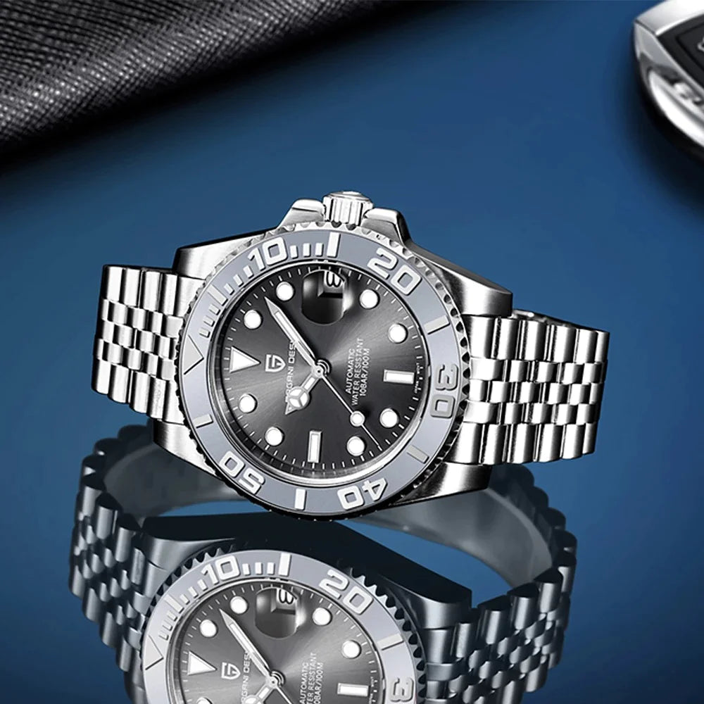 Silver wristwatch with black dial on a reflective surface with a blue gradient background